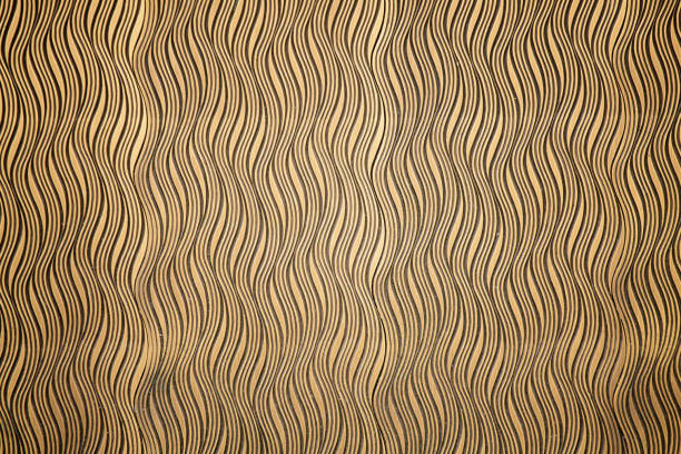 Abstract wavy pattern. Undulating golden ornament texture or background. Elegant wood carving embossing