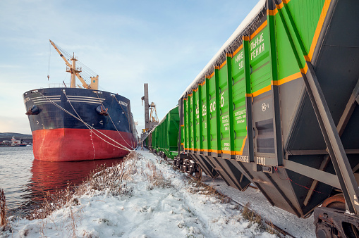 Murmansk, Russia - October, 31, 2014: Bulker, Self-unloading bunker freight cars (hoppers) in the territory of the Murmansk Commercial Sea Port awaiting unloading