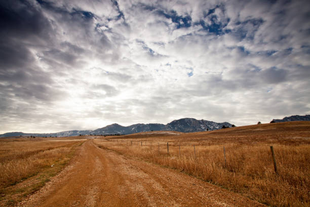 istock Intense clouds over a country road in Colorado 1250702112