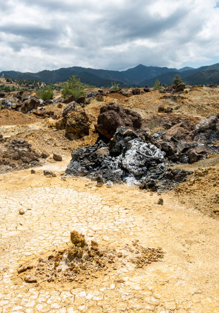 istock Dry deserted land of an abandoned copper mine. 1250710780
