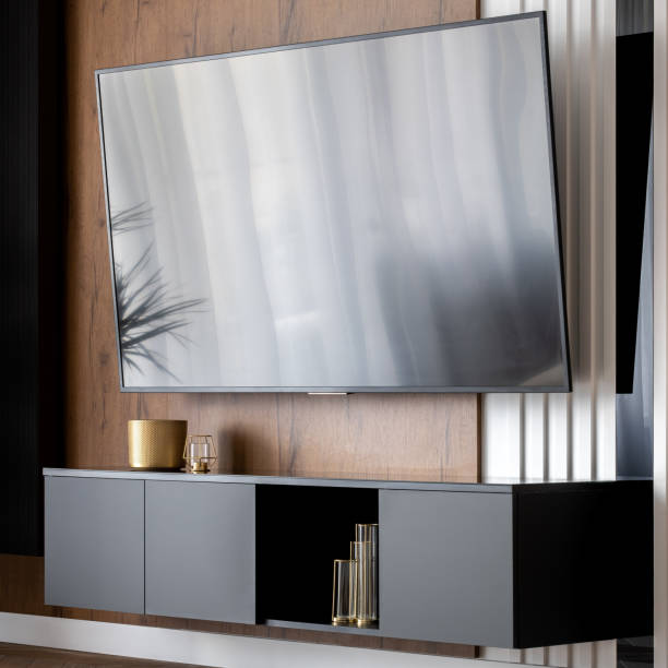 istock Big tv screen in living room 1250712098