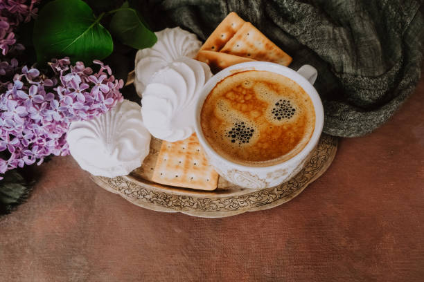istock Espresso coffee cup, zephyr and cookies on silver platter. 1250717867