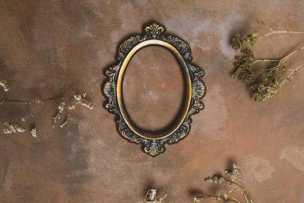 istock Vintage bronze oval picture frame mockup. 1250719232