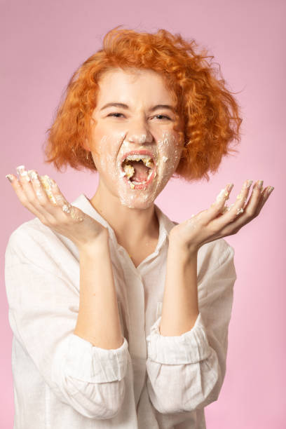 istock girl eats sweet dessert 1250721158