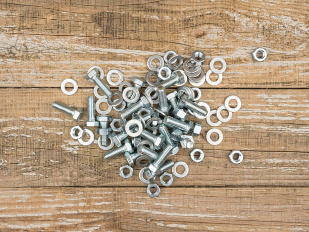 istock Accessories for mechanical fixing on a wooden background. 1250725857
