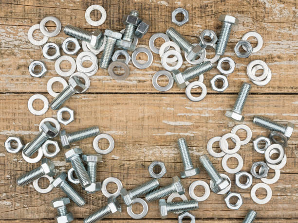 istock Elements for fixing at the repair and construction on a wooden background. 1250725891
