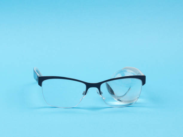 istock Glasses on blue background close-up. 1250726823