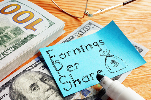 Earnings per share EPS is shown on the conceptual business photo