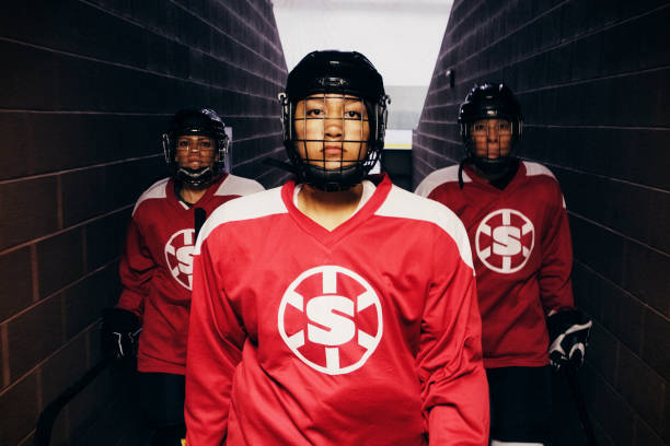 istock Woman Hockey Player 1250728862