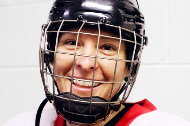 istock Woman's Hockey Player 1250729419