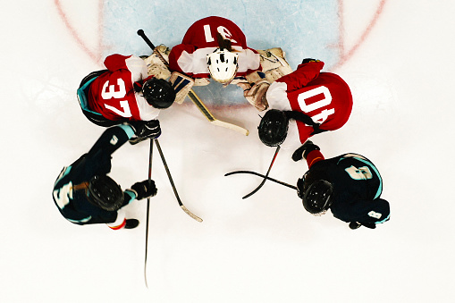 A woman’s ice hockey team playing a game.