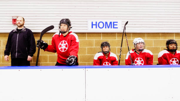 istock Woman Ice Hockey Team on the Bench 1250729751