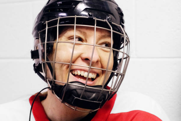 istock Woman's Hockey Player 1250729799