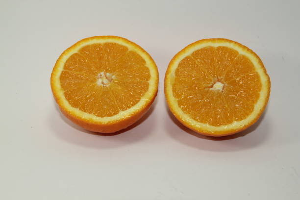 istock orange divided into two parts on a white background 1250731164
