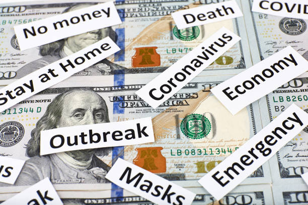 istock Coronavirus, COVID-19 headline clippings on 100 USD banknotes 1250738974