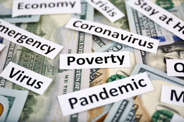istock Coronavirus, COVID-19 headline clippings on 100 USD banknotes 1250738978