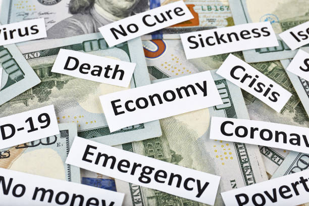 Coronavirus, COVID-19 headline clippings on 100 USD banknotes