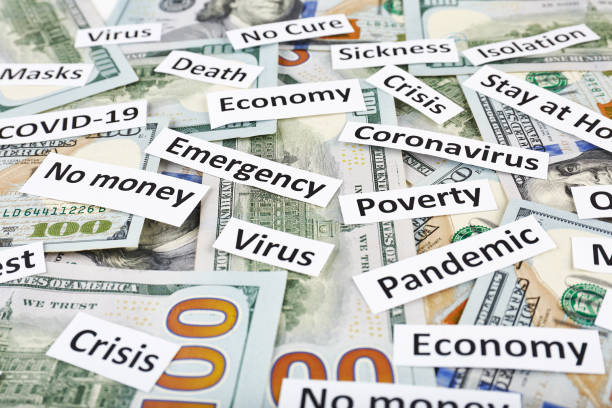 istock Coronavirus, COVID-19 headline clippings on 100 USD banknotes 1250738988