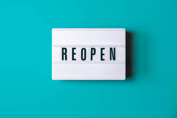 istock Signboard OPEN of lightbox on brick wall background 1250739086
