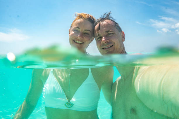 istock Vacation selfie of a young couple 1250739087
