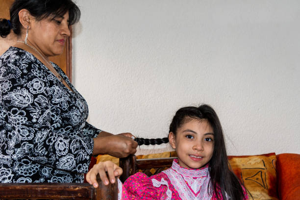 istock woman putting makeup on girl 1250745108