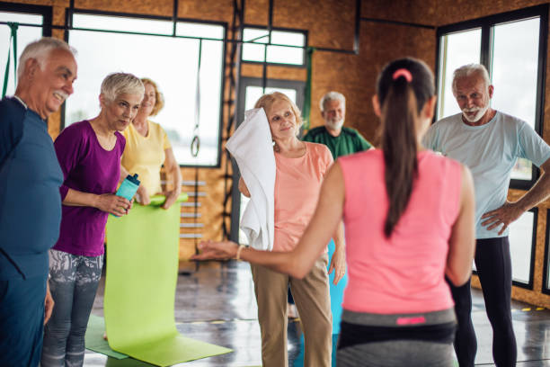 istock Satisfied seniors enjoying after their group yoga class 1250776478