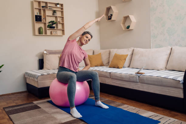 istock Happy woman maintaining shape at home 1250777532