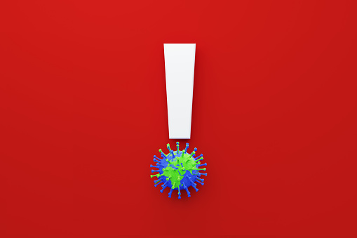 Virus shaped globe textured with world map sitting below a white exclamation point over red background, Horizontal composition. COVID-19 concept.