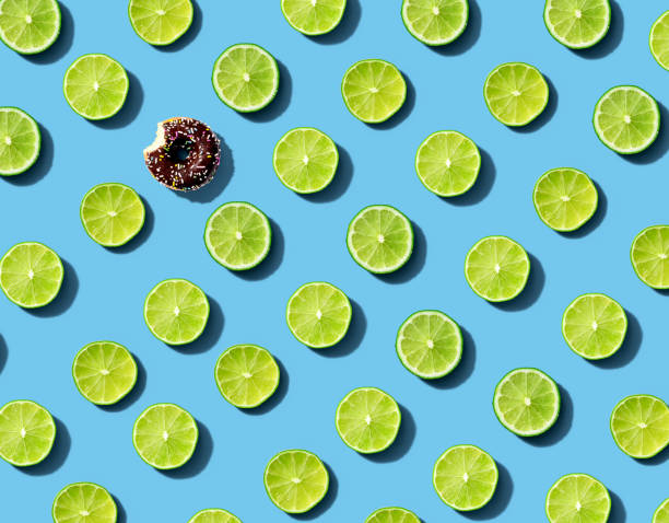 istock One out unique donut surrounded by limes 1250795554