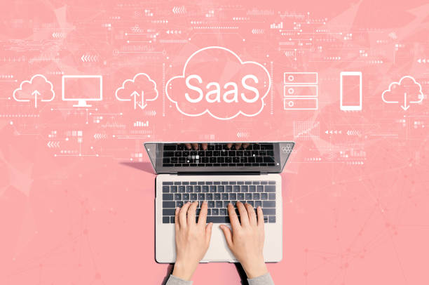 saas - software as a service concept with person using laptop - iaas imagens e fotografias de stock