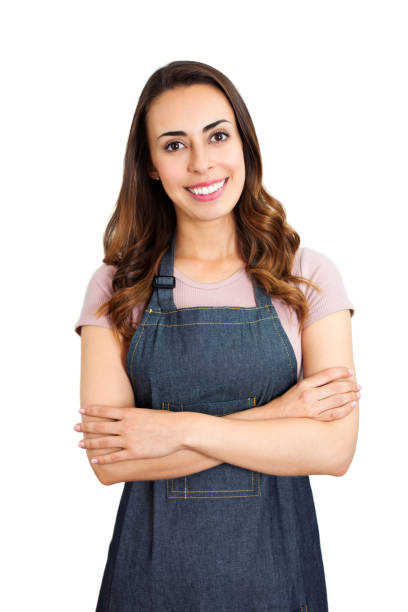 istock Female waitress with arms crossed smiling at camera 1250826539