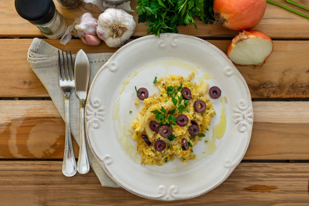 istock A delicious dish of shredded cod with potato straw. 1250892728