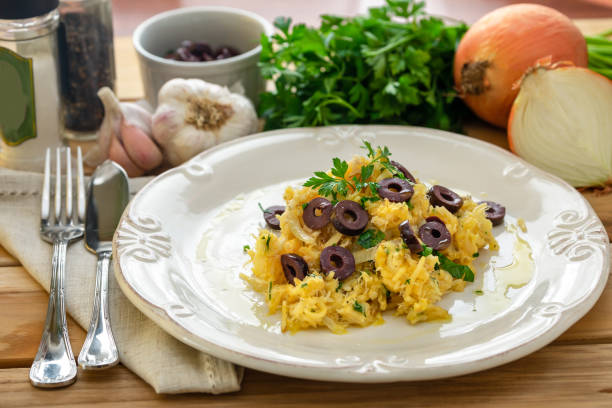 istock A delicious dish of shredded cod with potato straw. 1250892815