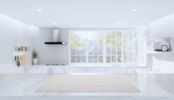 istock 3d rendering of marble counter product display cover by fabric cloth with kitchen blurred background. 1250904392