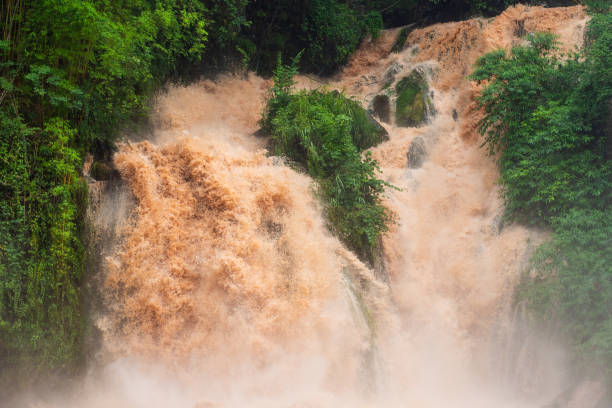 istock Flood water with brown mud close-up 1250907451