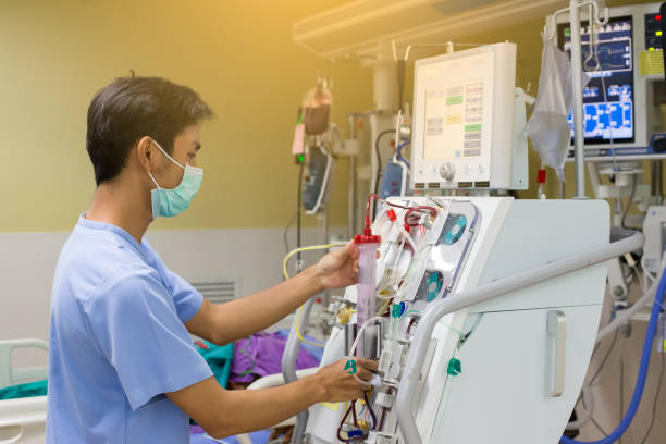 The specialist are doing continuous renal replacement therapy equipment and injection pump. The specialist are doing continuous renal replacement therapy equipment and injection pump. dialysis photos stock pictures, royalty-free photos & images