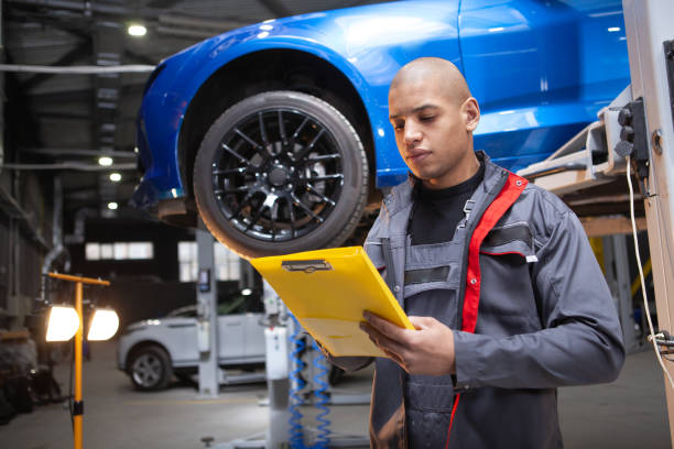 istock ale mechanic working at his garage 1250914738