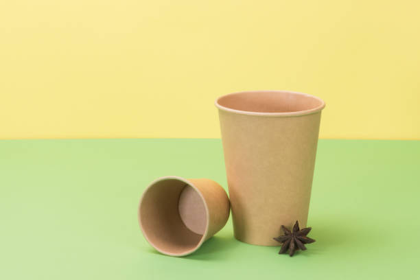 istock Kitchenware environmental and star anise on yellow, green background. 1250914860