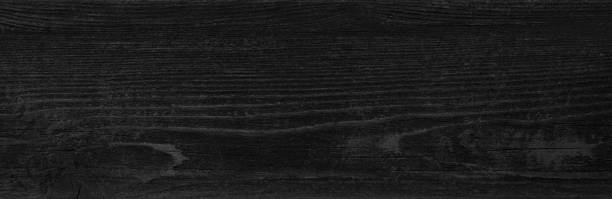 istock Black wood texture background. Dark panoramic banner 1250915896