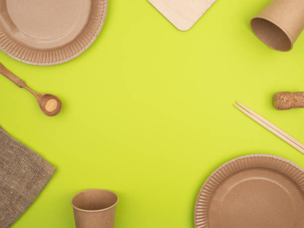 istock Table accessories from ecological materials on a green background. 1250916493