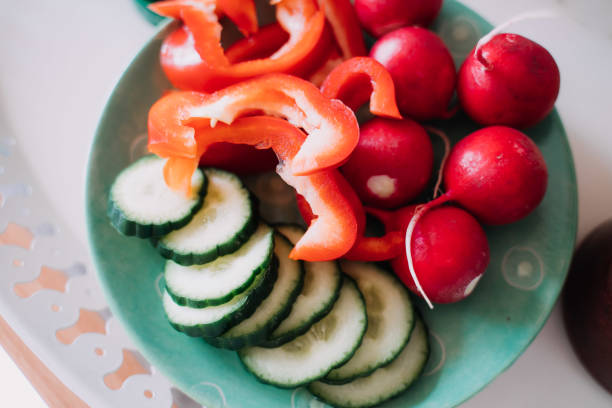 istock plate with vegetables for a vegetarian salad 1250916682