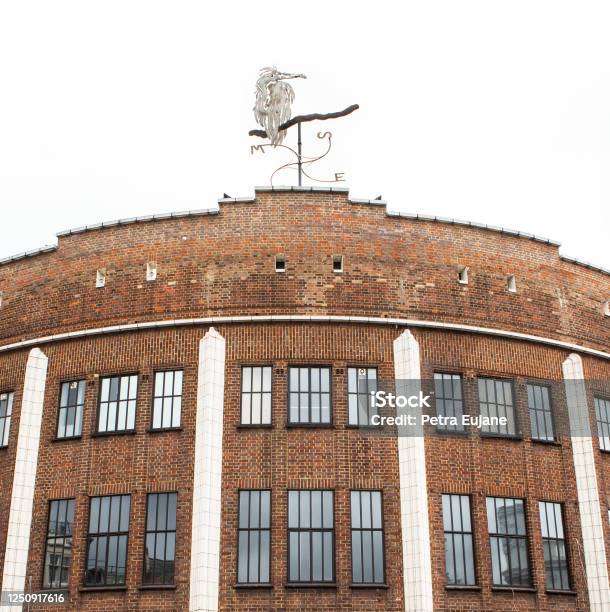 Brixton Art Deco Building With Weather Vane Stock Photo - Download Image Now - Brixton, London - England, Looking Up