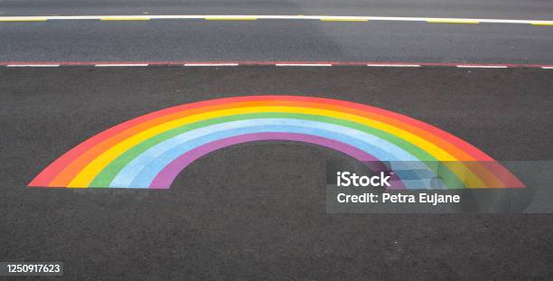 Rainbow On The Street Stock Photo - Download Image Now - Paint, Art, Asphalt