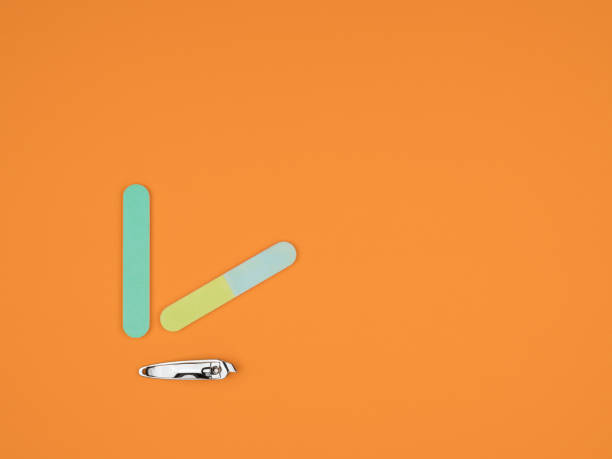 istock Manicure accessories on an orange background. 1250917655