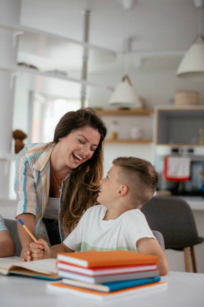 istock Parents helping the kids with their homework. 1250917706