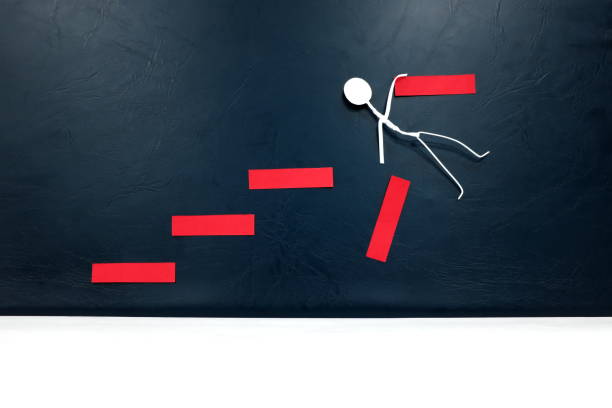 istock Never surrender and give up, hang on, keep going and strong determination on business challenges concept. Man hanging on broken ladder. 1250921818