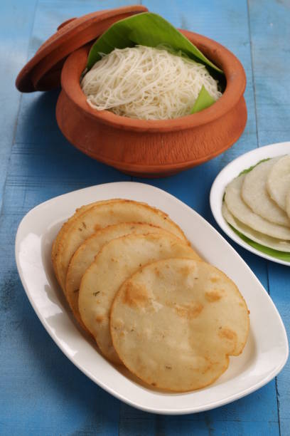 istock ideyappam and pathiri with blue BG 1250923035