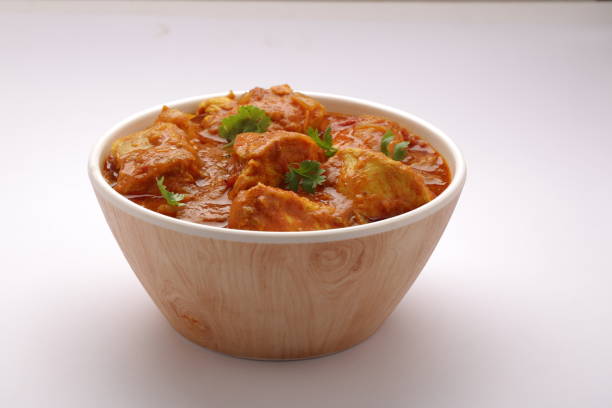 istock Chicken curry_wooden BG 1250923206