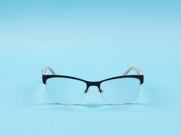 istock Glasses for vision correction on a blue background. 1250923214