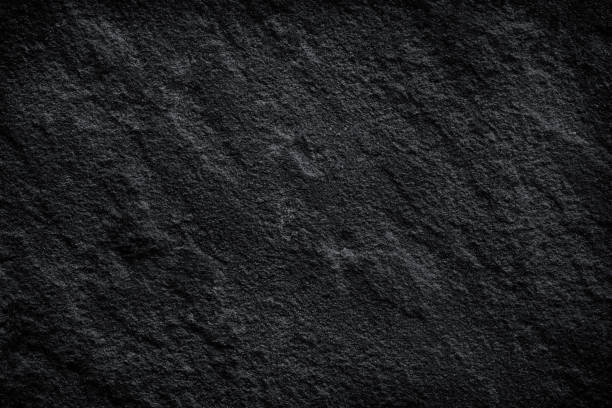 istock black stone natural background, dark grey slate 1250924097